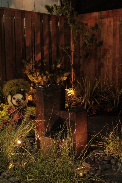Canada Blooms garden with pondless water feature and lighting