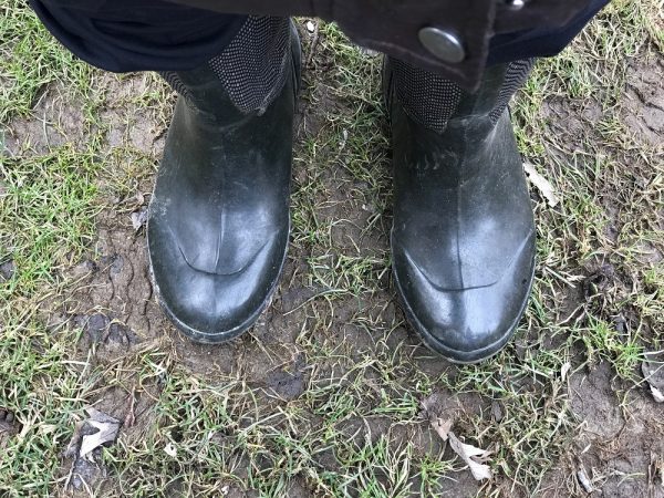 Boots on wet soil