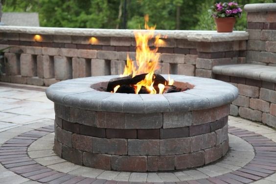 Round fire pit with insert (Brussels Block with Brussels Fullnose coping) Installed price approximately $3200 firepit6_march
