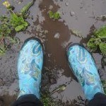 rubber boots and mud